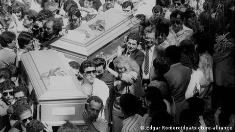 A picture taken in November 1989 shows the funeral of six Jesuit priests at the University Jose Simeon Canas (UCA) in El Salvador in November 1989