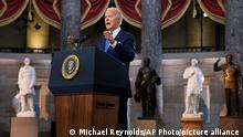 President Joe Biden speaks from Statuary Hall at the U.S. Capitol to mark the one year anniversary of the Jan. 6 riot at the U.S. Capitol by supporters loyal to then-President Donald Trump, Thursday, Jan. 6, 2022, in Washington. (Michael Reynolds/Pool via AP)