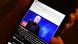 A man reads a post about Afghanistan professor Faizullah Jalal on his smartphone A man reads a post about Afghanistan professor Faizullah Jalal on his smartphone