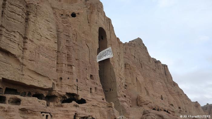 In the niche where a huge Buddha statue once stood is now a Taliban flag