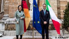 Italian Foreign Minister Luigi Di Maio (R) poses with German Foreign Minister Annalena Baerbock prior to their meeting at Villa Madama in Rome on January 10, 2022. (Photo by ANSA / AFP) / ITALY OUT