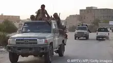 A grab from an AFPTV video shows Yemen pro-government fighters deploying on January 10, 2022 as forces in Yemen backed by a Saudi-led military coalition said they had seized control of the northern oil province of Shabwa from Iran-backed Huthi rebels. (Photo by AFPTV / AFP) (Photo by -/AFPTV/AFP via Getty Images)