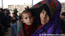 A mother and her child at a nutrition clinic run by WFP and UNICEF near an IDP camp on the outskirt of Herat in Afghanistan
