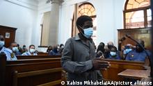 CAPE TOWN, SOUTH AFRICA - JANUARY 04: Zandile Christmas Mafe, a suspect in connection to a fire at the South African Parliament, appears in the Cape Town Magistrates Court in Cape Town on January 04, 2022. The fire began in the early hours on Jan. 2, 2022 and devastated much of the parliament complex in Cape Town. Xabiso Mkhabela / Anadolu Agency