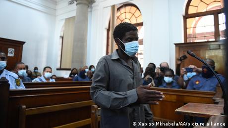 A man accused of setting fire to South Africa's parliament building has been charged with terrorism.