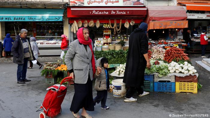 People shop at a market in Tunis, Tunisia November 20, 2019.