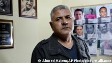 In this Nov. 21, 2018 photo, Gamal Eid, a prominent rights lawyer and advocate poses for a photograph after an interview with The Associated Press at his office, in Cairo, Egypt. (AP Photo/Ahmed Hatem)