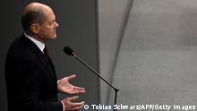 12.01.2022
German Chancellor Olaf Scholz addresses delegates during his first parliamentary question time at the Bundestag (lower house of parliament) in Berlin on January 12, 2022. (Photo by Tobias SCHWARZ / AFP) (Photo by TOBIAS SCHWARZ/AFP via Getty Images)