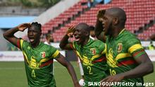 Mali's midfielder Amadou Haidara (L) and Mali's defender Hamari Traore celebrate the goal scored by Mali's forward Ibrahima Kone (R) during the Group F Africa Cup of Nations (CAN) 2021 football match between Tunisia and Mali at Limbe Omnisport Stadium in Limbe on January 12, 2022. (Photo by Issouf SANOGO / AFP) (Photo by ISSOUF SANOGO/AFP via Getty Images)