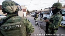 Military personnel guard a crime scene where three local police officers were killed by unknown assailants, according to local media, in Fresnillo, in Zacatecas state, Mexico January 11, 2022. REUTERS/Guillermo Moreno NO RESALES. NO ARCHIVES