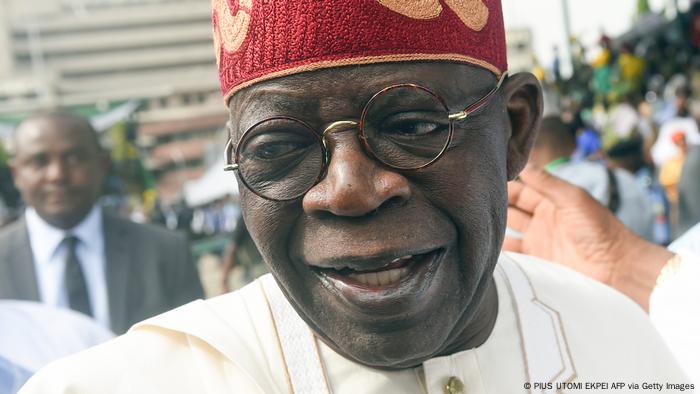 Bola Tinubu smiles into the camera