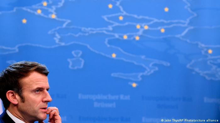 French President Emmanuel Macron in front of a map of Europe on Dec. 17, 2021