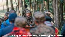 ETHIOPIA - NOVEMBER 29: (----EDITORIAL USE ONLY Äì MANDATORY CREDIT - Ethiopian Prime Minister's Office / HANDOUT - NO MARKETING NO ADVERTISING CAMPAIGNS - DISTRIBUTED AS A SERVICE TO CLIENTS----) Ethiopia's Prime Minister Abiy Ahmed speaks during a meeting with soldiers as he joins the battlefront against rebel groups for the second time in Ethiopia on November 29, 2021. Abiy Ahmed proceed to the front to lead the nation's army in countering a group of rebels advancing towards the capital, in Ethiiopia on November 29, 2021. Ethiopian Prime Minister's Office/Handout / Anadolu Agency