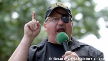 FILE - In this Sunday, June 25, 2017 file photo, Stewart Rhodes, founder of the citizen militia group known as the Oath Keepers speaks during a rally outside the White House in Washington. Rhodes, an Army veteran who founded the Oath Keepers in 2009 as a reaction to the presidency or Barack Obama, had been saying for weeks before the Jan. 6, 2021 Capitol riot that his group was preparing for a civil war and was armed, prepared to go in if the president calls us up. (AP Photo/Susan Walsh, File)