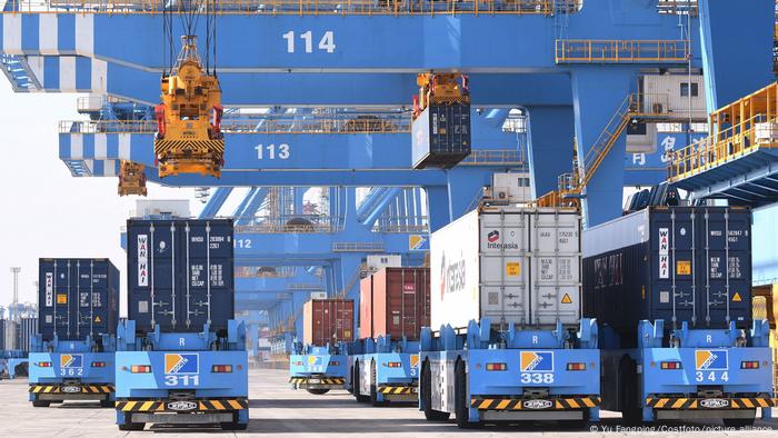 Cranes loading containers at a port