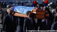Pallbearers carry the casket of European Parliament President David Sassoli for his funeral at Rome's Basilica of St. Mary of the Angels and of the Martyrs, in Rome, Italy, January 14, 2022. REUTERS/Guglielmo Mangiapane 