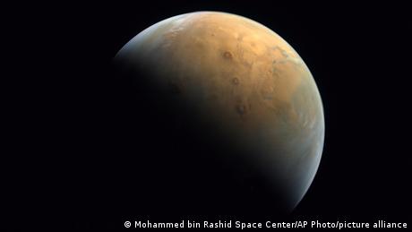 This Feb. 10, 2021 image taken by the United Arab Emirates' Amal, or Hope, probe released Sunday, Feb. 14, 2021, shows Mars