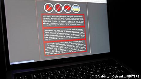 A photo of a laptop screen showing a warning message during a cyberattack in Ukraine in January 2022