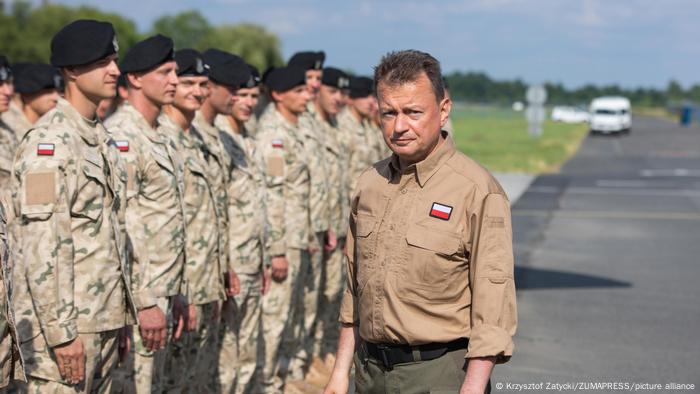 Defense Minister Mariusz Błaszczak inspects Polish troops at the Wroclaw Airbase. 