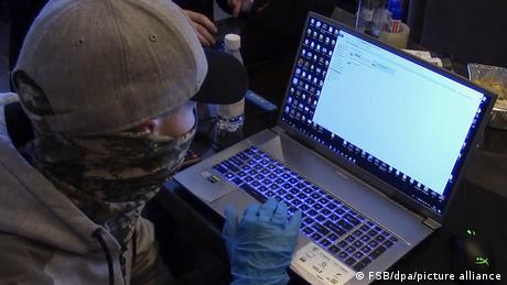 Man seated at laptop