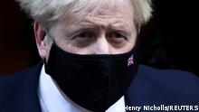 12.01.2022
FILE PHOTO: British Prime Minister Boris Johnson walks outside Downing Street in London, Britain, January 12, 2022. REUTERS/Henry Nicholls/File Photo