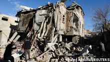 18.01.2022****Rescuers remove debris at the site of Saudi-led air strikes in Sanaa, Yemen, January 18, 2022. REUTERS/Khaled Abdullah