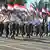 Popular Mobilization Forces parade in Diyala, Iraq, Saturday, June 26, 2021.