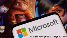 Microsoft logo is seen on a smartphone placed on displayed Activision Blizzard's games characters in this illustration taken January 18, 2022. REUTERS/Dado Ruvic/Illustration