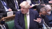 British Prime Minister Boris Johnson speaks during the weekly Prime Minister's Questions at the parliament in London, Britain January 19, 2022, in this screen grab taken from a video. Reuters TV via REUTERS THIS IMAGE HAS BEEN SUPPLIED BY A THIRD PARTY. NEWS AND CURRENT AFFAIRS USE ONLY, CANNOT BE USED FOR LIGHT ENTERTAINMENT OR SATIRICAL PURPOSES, PARTY POLITICAL BROADCAST USAGE MUST BE CLEARED WITH PBU.