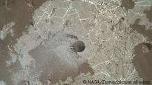 January 17, 2022 - Mars Surface - The Highfield drill hole, on Vera Rubin Ridge in Gale crater on Mars, made by NASA's Curiosity rover. Just recently, scientists announced that an analysis of rock samples collected by the rover were enriched in carbon 12, a type of carbon that on Earth is associated with biological processes. While the finding is intriguing, it doesn't necessarily point to ancient life on Mars, as scientists have not yet found conclusive supporting evidence of ancient or current biology there, such as sedimentary rock formations produced by ancient bacteria, or a diversity of complex organic molecules formed by life. The image of this drill hole was taken by the Mars Hand Lens Imager of the Curiosity rover on the 2,247th Martian day, or sol, of the mission. (Credit Image: © NASA/ZUMA Press Wire Service/ZUMAPRESS.com