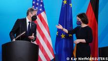 German Foreign Minister Annalena Baerbock and her U.S. counterpart Antony Blinken gesture during a joint press conference following their meeting in which they discussed the Ukraine crisis in Berlin, Germany, January 20, 2022. Kay Nietfeld/Pool via REUTERS