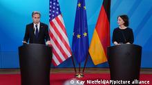Annalena Baerbock, Foreign Minister of Germany, holds a press conference with her counterpart from the US, Antony Blinken, after talks with the foreign ministers of Great Britain and France at the Federal Foreign Office in Berlin, Germany, Thursday, Jan.20, 2022. (Kay Nietfeld/Pool via AP)
