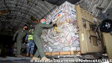 Australian Defence Forces members unload humanitarian assistance and engineering equipment from an aircraft at Fua'amotu International Airport, Tonga, January 20, 2022. Australian Department Of Defence/Handout via REUTERS THIS IMAGE HAS BEEN SUPPLIED BY A THIRD PARTY. NO RESALES. NO ARCHIVES