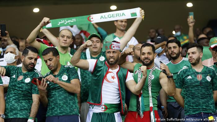 Algeria fans wear red, green and white