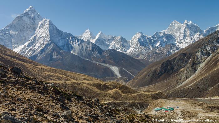Ama Dablam and other peaks of the Everset Region seen from the trail above Dughla