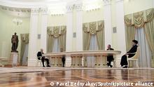 6744573 19.01.2022 Russian President Vladimir Putin, left, attends a meeting with Iranian President Ebrahim Raisi, in Moscow, Russia. Pavel Bednyakov / Sputnik
