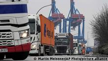 Trucks stand in lines at the container terminal Altenwerder at the port in Hamburg, Germany, Wednesday, Jan. 19, 2022. The harbor in Hamburg is Germany's largest seaport and the gateway for the country's export and import economy. (AP Photo/Martin Meissner)