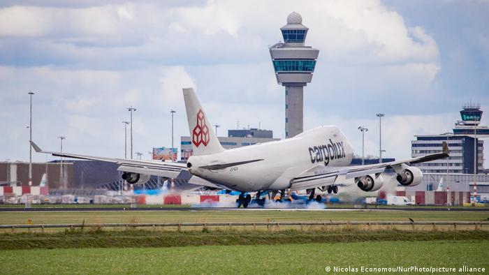 A Cargolux plane lands at Amsterdam Schiphol International Airport in The Netherlands