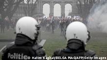 Illustration picture shows police forces and troubles in marge of the demonstration ¿¿ for freedom, democracy and human rights ¿ª organised by the alliance Europeans United and protesting against the measures imposed by public authorities in Belgium and other European countries to fight the covid pandemic, Sunday 23 January 2022 in Brussels. Recent days in Belgium figures of the number of people getting infected with the omicron variant have been peaking, reaching new record amounts every day. BELGA PHOTO HATIM KAGHAT (Photo by HATIM KAGHAT/BELGA MAG/AFP via Getty Images)