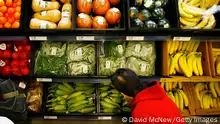 LOS ANGELES, CA - NOVEMBER 08: A shopper selects from pre-packaged produce at a Fresh & Easy grocery as Tesco PLC, the UK's biggest retailer, officially enters the U.S. market, opening its first six stores in southern California on November 8, 2007 in Los Angeles, California. Tesco is importing its own system of grocery store operations, making heavy use of pre-packaged produce, in contrast to U.S.-based grocery chains, to reduce overhead and refrigeration costs. The Fresh & Easy markets, which are significantly smaller than typical U.S. supermarkets, will use its own truck fleet for single deliveries from a centralized distribution center. The chain will operate from a relatively small $10,000 per square foot, producing more than a projected $200,000 a week, twice that per square foot of typical U.S. food stores . (Photo by David McNew/Getty Images)