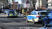 Police cars parked outside Heidelberg University 