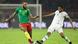 Comoros' defender Younn Zahary fights for the ball with Cameroon's forward Eric Choupo Moting Comoros' defender Younn Zahary fights for the ball with Cameroon's forward Eric Choupo Moting