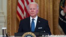 U.S. President Joe Biden listens to a question from Fox News reporter Peter Doocy after having a meeting with his Competition Council to speak about inflation and lowering prices for families in the East Room of the White House, in Washington, U.S. January 24, 2022. REUTERS/Leah Millis TPX IMAGES OF THE DAY 