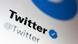Надпись Twitter на экране компьютера Надпись Twitter на экране компьютера
