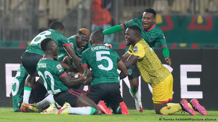Malawi's players celebrate a goal scored by teammate Gabadinho Mhango