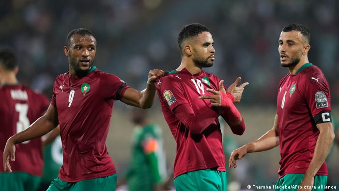Morocco's Youssef En-Nesyri, center, celebrates after scoring his team's first goal