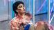 Film still ORFEAS2021, Mezzo-soprano Diamanti Kritsotaki , man with black hair sits, wearing bloodied transparent plastic wrap Film still ORFEAS2021, Mezzo-soprano Diamanti Kritsotaki , man with black hair sits, wearing bloodied transparent plastic wrap