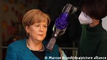 Почему с Ангелы Меркель вновь сдувают пылинки (фото)