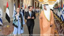 Israeli President Isaac Herzog and Foreign Minister of the United Arab Emirates, Sheikh Abdullah bin Zayed Al Nahyan, talk as they walk through an airport in Abu Dhabi, United Arab Emirates January 30, 2022. Amos Ben-Gershom/Government Press Office (GPO)/Handout via REUTERS THIS IMAGE HAS BEEN SUPPLIED BY A THIRD PARTY. MANDATORY CREDIT

