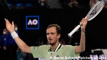 Daniil Medvedev of Russia reacts after winning the second set against Rafael Nadal of Spain during the men's singles final at the Australian Open tennis championships in Melbourne, Australia, Sunday, Jan. 30, 2022. (AP Photo/Simon Baker)